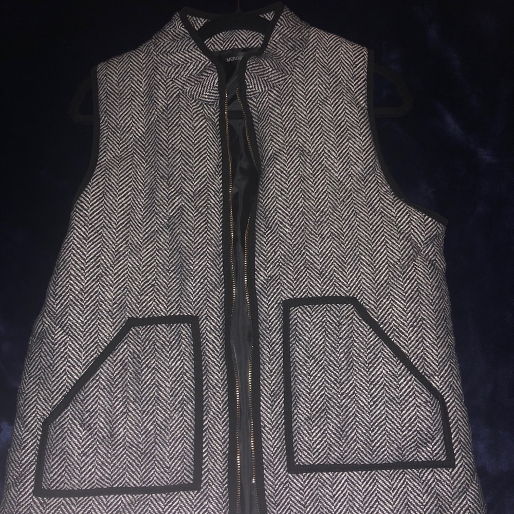 Black and white vest